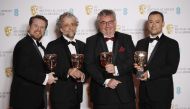 Brian Connor, Paul Lambert, Tristan Myles and Gerd Nefzer pose with their award for Best Special Visual Effects for 
