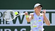 Iga Swiatek (POL) hits a shot during her third round match against Clara Tauson (DEN) at the BNP Paribas Open at the Indian Wells Tennis Garden. Jayne Kamin-Oncea-USA TODAY Sports