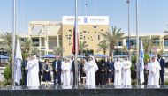 H E Dr. Mohammed bin Saleh Al Sada, Chairman of UDST’s Board of Trustees, and other officials at the flag raising ceremony. 