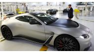 Aston Martin CEO Tobias Moers walks past the newly unveiled V12 Vantage car at the company’s factory in Gaydon, Britain, March 16, 2022. REUTERS/Phil Noble