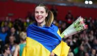 Ukraine's Yaroslava Mahuchikh celebrates winning the women's high jump final (REUTERS/Aleksandra Szmigiel)