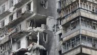 A view shows a residential building which was damaged during Ukraine-Russia conflict in the besieged southern port city of Mariupol, Ukraine March 18, 2022. REUTERS.