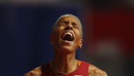 March 20, 2022 Venezuela's Yulimar Rojas celebrate winning goal and setting a new world record in the women's triple jump final REUTERS/Bernadett Szabo