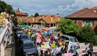 Student climate activists march from Kirribilli House to the Sydney Harbour Bridge, in Sydney, Australia, March 25, 2022. REUTERS/Cordelia Hsu