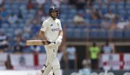 England's Joe Root walks after losing his wicket Action Images via Reuters/Jason Cairnduff
