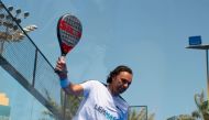 A padel player in action during yesterday's qualifying round.