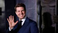 Actor Tom Cruise poses while promoting his latest film 