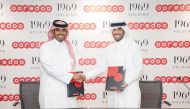 Officials from Ooredoo and 1969 Holding during the partnership signing event. 