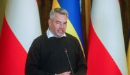Austrian Chancellor Karl Nehammer attends a joint news conference with Ukrainian President Volodymyr Zelenskiy, as Russia’s attack on Ukraine continues, in Kyiv, Ukraine April 9, 2022. REUTERS/Valentyn Ogirenko
