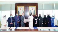 Public Health Department Director, MoPH, Sheikh Dr. Mohammed bin Hamad Al Thani; Nicholas Boucher, Head of the Science and Innovation Network, British Embassy in Doha; and other officials at the agreement-signing ceremony. 