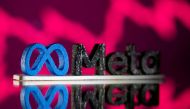 A 3D printed Facebook's new rebrand logo Meta is seen in front of displayed stock graph in this illustration taken on November 2, 2021. REUTERS/Dado Ruvic/Illustration//File Photo