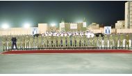 The Amiri Guard School officials and the course participants during the celebration of graduation of the security course.