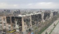 An aerial view shows residential buildings damaged during Ukraine-Russia conflict in the southern port city of Mariupol, Ukraine April 18, 2022. Picture taken with a drone. REUTERS/Pavel Klimov
