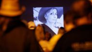 People attend a vigil for late cinematographer Halyna Hutchins, who was fatally shot on the film set of 