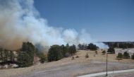 Smoke drifts from a fire in the neighbourhood of The Farm, in Colorado Springs, Colorado, U.S., April 22, 2022 in this image obtained from social media via REUTERS

