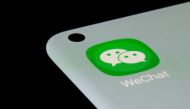 WeChat app is seen on a smartphone in this illustration taken, July 13, 2021. REUTERS/Dado Ruvic/Illustration