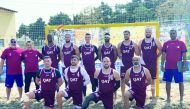 Qatar beach handball players and officials.