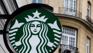 The Starbucks logo is seen outside a Starbucks cafe in Warsaw March 6, 2011. REUTERS/Kacper Pempel/File Photo