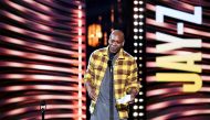 FILE PHOTO: Dave Chappelle introduces Jay-Z during the Rock and Roll Hall of Fame induction ceremony in Cleveland, Ohio, U.S. October 30, 2021. REUTERS/Gaelen Morse/File Photo
