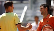 May 6, 2022 Serbia's Novak Djokovic shakes hands with Poland's Hubert Hurkacz after winning their quarter final match REUTERS/Juan Medina