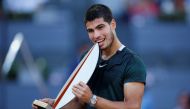 May 8, 2022 Spain's Carlos Alcaraz Garfia celebrates with the trophy after winning the final against Germany's Alexander Zverev REUTERS/Juan Medina