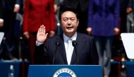 South Korean President Yoon Suk-yeol takes an oath during his inauguration in front of the National Assembly in Seoul, South Korea, May 10, 2022. Jeon Heon-Kyun /Pool via REUTERS