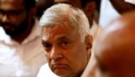 File photo: Ranil Wickremesinghe, newly appointed prime minister, arrives at a Buddhist temple after his swearing-in ceremony amid the country's economic crisis, in Colombo, Sri Lanka, May 12, 2022. Reuters/Dinuka Liyanawatte/File Photo
 