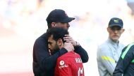 Liverpool's Mohamed Salah with manager Juergen Klopp after being substituted REUTERS/Hannah Mckay