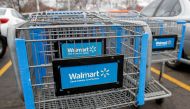 Walmart shopping carts are seen on the parking lot ahead of the Thanksgiving holiday in Chicago, Illinois, U.S. November 27, 2019. REUTERS/Kamil Krzaczynski/File Photo