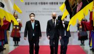 US President Joe Biden and South Korean President Yoon Suk-yeol arrive for a state dinner at the National Museum of Korea, in Seoul, South Korea, May 21, 2022. Lee Jin-man/Pool via Reuters