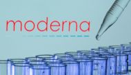 :FILE PHOTO: Test tubes are seen in front of a displayed Moderna logo in this illustration taken, May 21, 2021. REUTERS/Dado Ruvic/Illustration