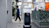 A robot using 5G network moves during a demonstration at the Naver 1784 company office in Seongnam, South Korea, May 13, 2022. Picture taken May 13, 2022. REUTERS/ Heo Ran