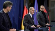 German Chancellor Olaf Scholz speaks during a joint news conference with German Economy and Climate Minister Robert Habeck and German Finance Minister Christian Lindner in Berlin, Germany, January 21, 2022. Michael Sohn/Pool via REUTERS/File Photo
 