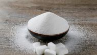 FILE PHOTO: Granulated white sugar and sugar cubes are seen in this picture illustration taken December 16, 2018. REUTERS/Emmanuel Foudrot/Illustration/File Photo/File Photo
