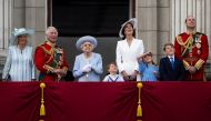 The Queen along with members of the Royal Family watches the special flypast by Britain's RAF (Royal Air Force) from Buckingham Palace balcony following the Trooping the Colour parade, as a part of her platinum jubilee celebrations, in London, Britain June 2, 2022. Paul Grover/Pool via REUTERS
