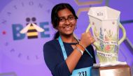 Harini Logan, 14, from San Antonio, Texas, holds the trophy after winning the annual Scripps National Spelling Bee held at National Harbor in Oxon Hill, Maryland, U.S., June 2, 2022. Reuters/Jonathan Ernst
