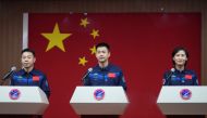 Chinese astronauts Cai Xuzhe, Chen Dong and Liu Yang attend a news conference before the Shenzhou-14 spaceflight mission. China Daily via Reuters 