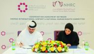MATAR Chief Operations Officer Engr. Badr Mohammed Al Meer (left), and NHRC Chairperson Maryam bint Abdullah Al Attiyah signing the agreement.