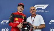 Ferrari's Charles Leclerc celebrates after winning pole position REUTERS/Hamad I Mohammed/Pool