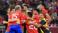 Costa Rica players celebrate after qualifying for the Qatar 2022 FIFA World Cup REUTERS/Mohammed Dabbous
