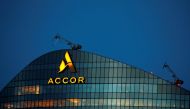 The logo of French hotel operator AccorHotels is seen on top of the company's headquarters in Issy-les-Moulineaux near Paris, France, February 17, 2021. REUTERS/Gonzalo Fuentes/File Photo