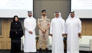 Minister of Justice H E Masoud bin Mohammed Al Ameri with other official during the panel discussion. 