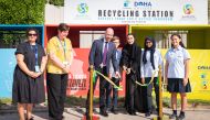 Officials from Doha College opening the recycling centre.