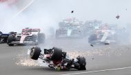 Alfa Romeo's Guanyu Zhou crashes out at the start of the race. (Reuters/Molly Darlington)