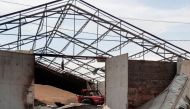 Seeds are seen in a grain silo destroyed after it was shelled repeatedly, amid Russia's invasion of Ukraine, in Donetsk region, Ukraine May 31, 2022. REUTERS/Serhii Nuzhnenko/File Photo

