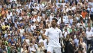 Serbia's Novak Djokovic celebrates winning his quarter final match against Italy's Jannik Sinner REUTERS/Toby Melville
