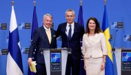 Sweden's Foreign Minister Ann Linde and Finland's Foreign Minister Pekka Haavisto attend a news conference with NATO Secretary General Jens Stoltenberg, after signing their countries' accession protocols at the alliance's headquarters in Brussels, Belgium July 5, 2022. REUTERS/Yves Herman/File Photo
