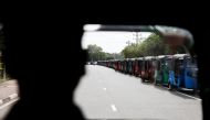 Three-wheelers queue for petrol near a Lanka IOC fuel station (Indian Oil Corporation) due to fuel shortage, amid the country's economic crisis, in Colombo, Sri Lanka, July 6, 2022. REUTERS/Dinuka Liyanawatte