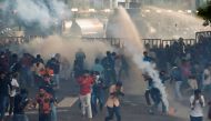 Police use tear gas and water cannons to disperse demonstrators near President's residence during a protest demanding the resignation of President Gotabaya Rajapaksa, amid the country's economic crisis, in Colombo, Sri Lanka, July 8, 2022. (Reuters/Dinuka Liyanawatte)