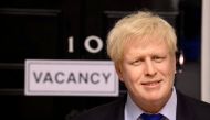 FILE PHOTO: A wax figure of Boris Johnson is pictured next to a 'vacancy' sign on 10 Downing Street at Madame Tussauds, in London, Britain July 7, 2022. Madame Tussauds London 

